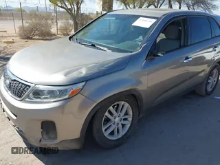 2014 Kia Sorento LX with VIN 5XYKT3A6XEG480411, listed as a IAAI auction lot 42008356 with 137,435 mi miles and . Bid and sale history available at DreamBid. Image 6.