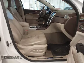 2013 Cadillac SRX Premium Collection с VIN 3GYFNEE33DS574080, выставлен на аукционе IAAI как лот 42166048 с пробегом 109 393 миль миль и . История ставок и продаж доступна на DreamBid. Изображение 5.