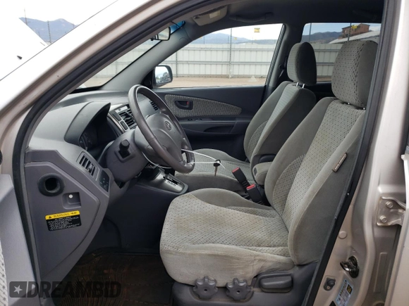 2005 Hyundai Tucson GLS with VIN KM8JN72D05U139992, listed as a Copart auction lot 70786014 with 108,827 mi miles and Salvage Title. Bid and sale history available at carsss.com. Image 7.