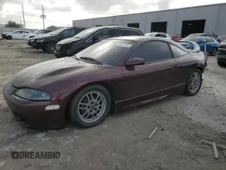 1999 Mitsubishi Eclipse with VIN 4A3AK44Y7XE104372, listed as a Copart auction lot 78361734 with 112,595 mi miles and Salvage Title. Bid and sale history available at DreamBid. Image 1.