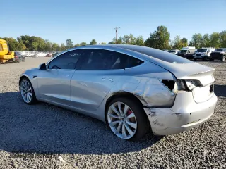 2018 Tesla Model 3 Long Range Battery with VIN 5YJ3E1EB4JF074295, listed as a Copart auction lot 74775384 with 83,515 mi miles and Salvage Title. Bid and sale history available at DreamBid. Image 2.