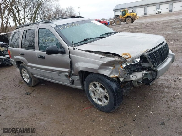 1999 Jeep Grand Cherokee Laredo with VIN 1J4GW58N0XC748809, listed as a IAAI auction lot 41722910 with 201,407 mi miles. Bid and sale history available at carsss.com. Image 1.