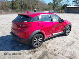 2016 Mazda CX-3 Grand Touring with VIN JM1DKFD72G0129096, listed as a IAAI auction lot 41592893 with 144,860 mi miles. Bid and sale history available at carsss.com. Image 4.
