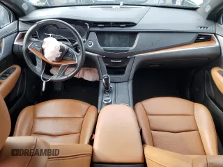 2023 Cadillac XT5 FWD Premium Luxury with VIN 1GYKNCRS6PZ100071, listed as a Copart auction lot 76248224 with 25,613 mi miles and Salvage Title. Bid and sale history available at carsss.com. Image 8.