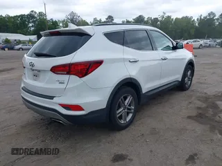 2018 Hyundai Santa Fe 2.4L z VIN 5XYZUDLB1JG543837, wystawiony jako IAAI lot #42235471 z przebiegiem 157 909 mil mil oraz . Historia ofert i sprzedaży dostępna na DreamBid. Obrazek 4.