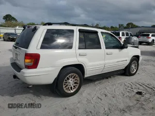 2002 Jeep Grand Cherokee Limited with VIN 1J4GX58S72C139972, listed as a Copart auction lot 47767395 with 163,395 mi miles and Salvage Title. Bid and sale history available at DreamBid. Image 3.