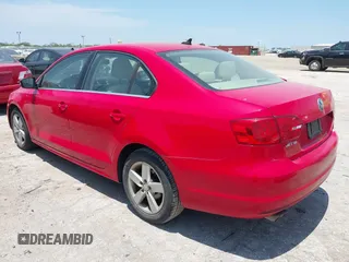 2013 Volkswagen Jetta TDI w/Premium with VIN 3VW3L7AJ6DM287865, listed as a IAAI auction lot 42480102 with 181,677 mi miles and . Bid and sale history available at DreamBid. Image 3.