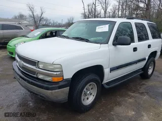2001 Chevrolet Tahoe LT with VIN 1GNEC13T21R211052, listed as a IAAI auction lot 41666765 with 113,366 mi miles. Bid and sale history available at carsss.com. Image 2.