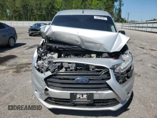 2019 Ford Transit Connect XLT z VIN NM0LS7F21K1431434, wystawiony jako Copart lot #52490285 z przebiegiem 136 826 mil mil oraz Szkody całkowita. Historia ofert i sprzedaży dostępna na DreamBid. Obrazek 5.