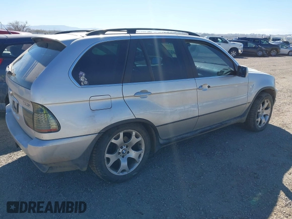 2001 BMW X5 4.4i with VIN WBAFB33581LH23527, listed as a IAAI auction lot 41851365 with 158,858 mi miles. Bid and sale history available at carsss.com. Image 4.