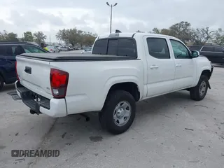 2022 Toyota Tacoma SR with VIN 3TMCZ5AN7NM470444, listed as a IAAI auction lot 41729041 with 34,248 mi miles and . Bid and sale history available at DreamBid. Image 4.