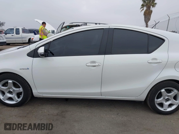 2013 Toyota Prius One with VIN JTDKDTB32D1032454, listed as a IAAI auction lot 42087724 with 202,293 mi miles and . Bid and sale history available at carsss.com. Image 15.