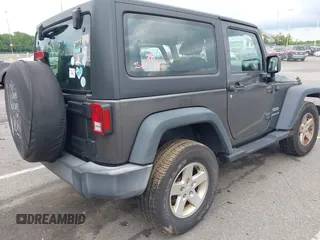 2016 Jeep Wrangler Willys Wheeler with VIN 1C4GJWAG2GL318981, listed as a IAAI auction lot 42390588 with 131,559 mi miles and . Bid and sale history available at DreamBid. Image 4.