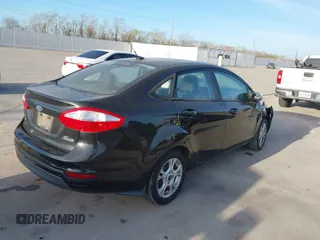 2014 Ford Fiesta SE with VIN 3FADP4BJ0EM139467, listed as a IAAI auction lot 41817437 with 45,570 mi miles and . Bid and sale history available at DreamBid. Image 4.