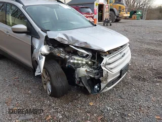 2018 Ford Escape SEL with VIN 1FMCU9HD6JUA58844, listed as a IAAI auction lot 40863795 with 74,907 mi miles. Bid and sale history available at carsss.com. Image 6.
