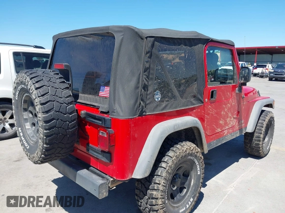 2005 Jeep Wrangler SE with VIN 1J4FA29S45P311320, listed as a IAAI auction lot 42095396 with 93,808 mi miles. Bid and sale history available at carsss.com. Image 4.