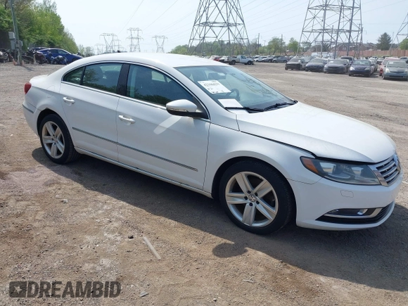 2013 Volkswagen CC Sport with VIN WVWBP7AN0DE523261, listed as a IAAI auction lot 42106039 with 136,105 mi miles. Bid and sale history available at carsss.com. Image 1.