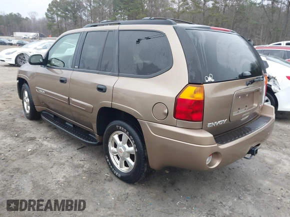 2003 GMC Envoy SLE with VIN 1GKDT13S332264984, listed as a IAAI auction lot 41523191 with 227,004 mi miles. Bid and sale history available at carsss.com. Image 3.