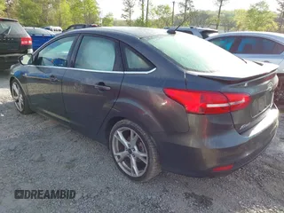2016 Ford Focus Titanium with VIN 1FADP3J25GL282293, listed as a IAAI auction lot 41998959 with 119,781 mi miles and . Bid and sale history available at DreamBid. Image 3.