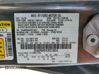 2020 Ford Fusion SE z VIN 3FA6P0HD4LR213055, wystawiony jako Copart lot #63552665 z przebiegiem 126 005 mil mil oraz Czysty tytuł • Clean title. Historia ofert i sprzedaży dostępna na DreamBid. Obrazek 12.