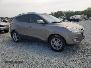 2013 Hyundai Tucson GLS with VIN KM8JU3AC4DU588322, listed as a Copart auction lot 52991475 with 174,335 mi miles and Clean Title. Bid and sale history available at carsss.com. Image 4.