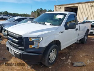 2016 Ford F-150 XL with VIN 1FTMF1C85GKE69350, listed as a IAAI auction lot 41690906 with 162,338 mi miles. Bid and sale history available at carsss.com. Image 2.