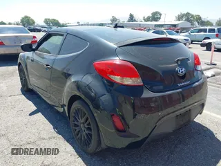 2013 Hyundai Veloster w/Black Int with VIN KMHTC6AD4DU151409, listed as a IAAI auction lot 42639582 with 283,208 mi miles and . Bid and sale history available at DreamBid. Image 6.