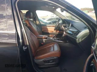 2014 BMW X5 sDrive35i with VIN 5UXKR2C50E0H31926, listed as a IAAI auction lot 41838021 with 125,813 mi miles. Bid and sale history available at carsss.com. Image 5.