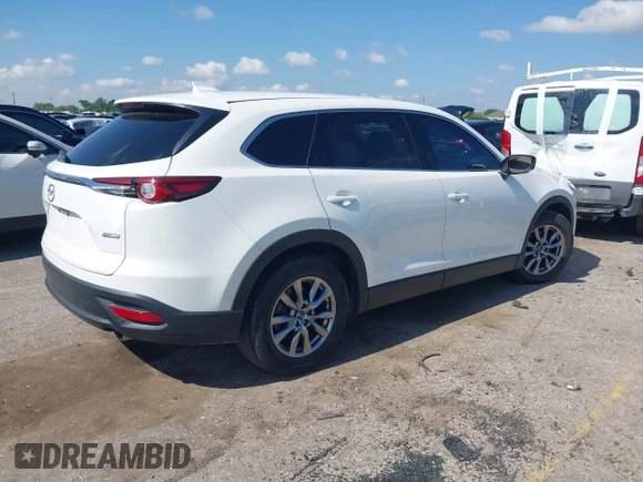 2019 Mazda CX-9 Touring with VIN JM3TCACY7K0314539, listed as a IAAI auction lot 42234361 with 98,299 mi miles and . Bid and sale history available at DreamBid. Image 4.