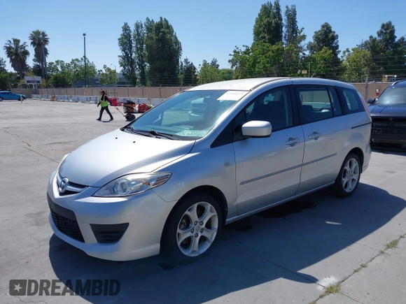 2009 Mazda 5 Touring z VIN JM1CR29L090334702, wystawiony jako IAAI lot #42349375 z przebiegiem 188 173 mil mil oraz . Historia ofert i sprzedaży dostępna na DreamBid. Obrazek 6.