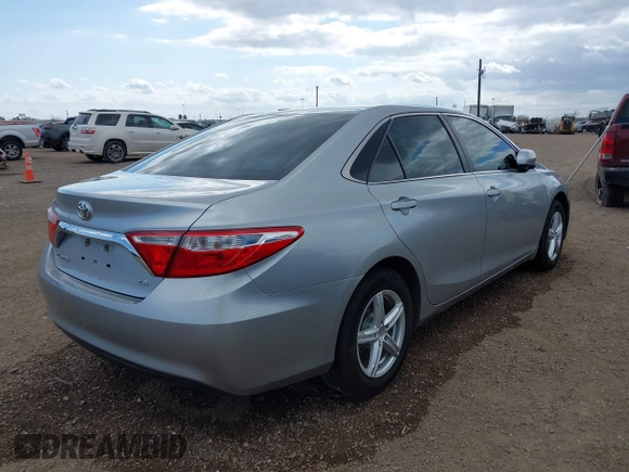 2015 Toyota Camry XLE with VIN 4T1BF1FK1FU475840, listed as a IAAI auction lot 41669607 with 104,881 mi miles. Bid and sale history available at carsss.com. Image 4.