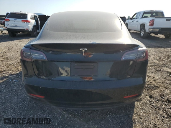 2019 Tesla Model 3 Mid Range z VIN 5YJ3E1EAXKF398909, wystawiony jako Copart lot #52504645 z przebiegiem 101 667 mil mil oraz Szkoda całkowita • Salvage title. Historia ofert i sprzedaży dostępna na DreamBid. Obrazek 6.