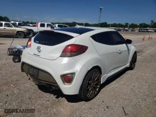 2014 Hyundai Veloster Turbo with VIN KMHTC6AE9EU186571, listed as a Copart auction lot 44856142 with 125,356 mi miles and Clean Title. Bid and sale history available at carsss.com. Image 4.