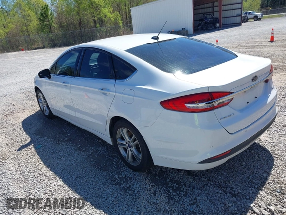 2018 Ford Fusion SE z VIN 3FA6P0H77JR142828, wystawiony jako IAAI lot #41820649 z przebiegiem 208 517 mil mil oraz . Historia ofert i sprzedaży dostępna na DreamBid. Obrazek 3.
