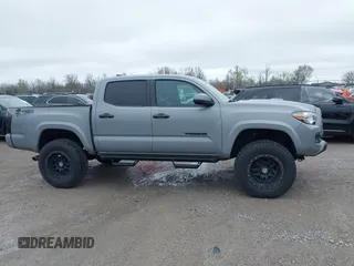 2021 Toyota Tacoma SR z VIN 3TMCZ5AN5MM372821, wystawiony jako IAAI lot #41886586 z przebiegiem 68 878 mil mil oraz . Historia ofert i sprzedaży dostępna na DreamBid. Obrazek 13.