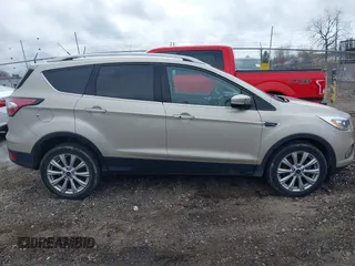 2017 Ford Escape Titanium with VIN 1FMCU9JD1HUB05881, listed as a IAAI auction lot 41966842 with 185,963 mi miles. Bid and sale history available at carsss.com. Image 13.