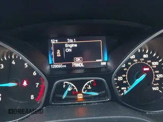 2015 Ford Focus SE with VIN 1FADP3F21FL376579, listed as a IAAI auction lot 41972088 with 129,593 mi miles. Bid and sale history available at carsss.com. Image 7.