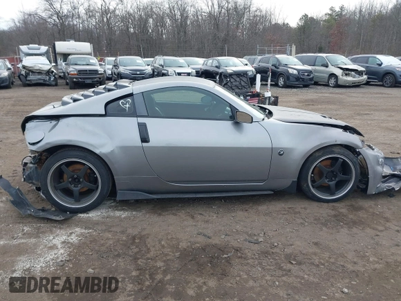 2003 Nissan 350Z Touring z VIN JN1AZ34E33T003711, wystawiony jako IAAI lot #41351191 z przebiegiem 167 503 mil mil oraz . Historia ofert i sprzedaży dostępna na DreamBid. Obrazek 13.