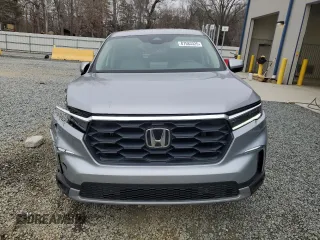 2025 Honda Pilot EX-L with VIN 5FNYG1H40SB002296, listed as a Copart auction lot 87583325 with 6,811 mi miles and Salvage Title. Bid and sale history available at carsss.com. Image 5.