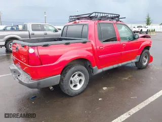 2005 Ford Explorer Sport Trac XLS with VIN 1FMZU67K75UB39737, listed as a IAAI auction lot 41745919 with 190,266 mi miles. Bid and sale history available at carsss.com. Image 4.
