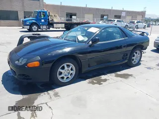 1995 Mitsubishi 3000GT GT z VIN JA3AM84J1SY026510, wystawiony jako IAAI lot #42298430 z przebiegiem 288 509 mil mil oraz . Historia ofert i sprzedaży dostępna na DreamBid. Obrazek 2.