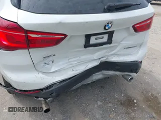 2021 BMW X1 xDrive28i with VIN WBXJG9C07M5U21337, listed as a IAAI auction lot 42590859 with 35,934 mi miles and . Bid and sale history available at DreamBid. Image 6.