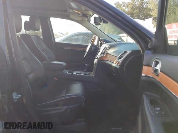 2013 Jeep Grand Cherokee Overland with VIN 1C4RJECT2DC546634, listed as a IAAI auction lot 41180807 with 111,897 mi miles. Bid and sale history available at carsss.com. Image 5.