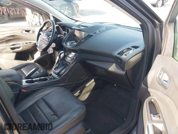 2015 Ford Escape Titanium with VIN 1FMCU9J90FUB58306, listed as a IAAI auction lot 41815151 with 136,835 mi miles. Bid and sale history available at carsss.com. Image 5.
