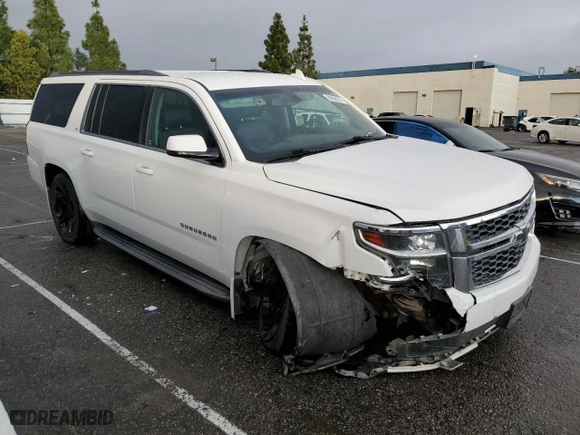2015 Chevrolet Suburban LS with VIN 1GNSCHKC9FR667540, listed as a Copart auction lot 80908574 with 125,428 mi miles and Salvage Title. Bid and sale history available at carsss.com. Image 4.