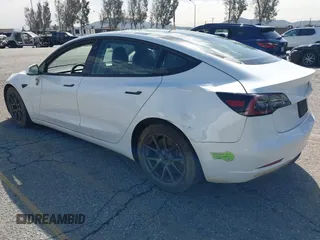 2023 Tesla Model 3 with VIN 5YJ3E1EA8PF398110, listed as a IAAI auction lot 41692006 with 112,699 mi miles and . Bid and sale history available at carsss.com. Image 3.