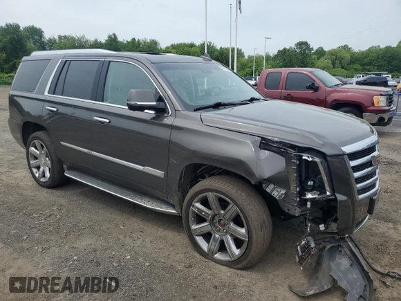 2020 Cadillac Escalade Luxury with VIN 1GYS4BKJ2LR101971, listed as a Copart auction lot 58312245 with 58,069 mi miles and Salvage title. Bid and sale history available at DreamBid. Image 4.