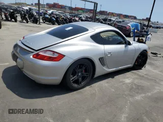 2007 Porsche Cayman S с VIN WP0AB29837U780257, выставлен на аукционе Copart как лот 68733494 с пробегом 164 227 миль миль и Списание • Salvage title. История ставок и продаж доступна на DreamBid. Изображение 3.