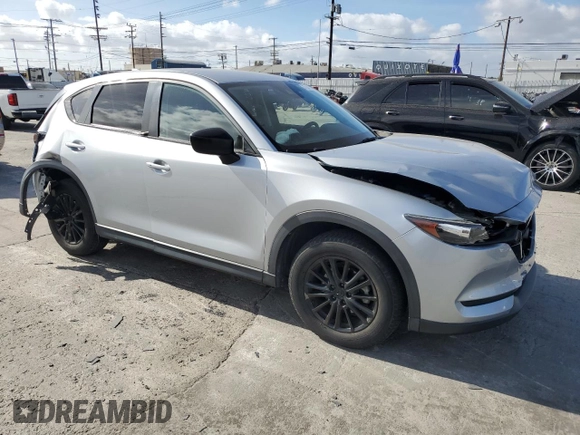 2019 Mazda CX-5 Touring with VIN JM3KFACMXK1556090, listed as a Copart auction lot 47541005 with 82,030 mi miles and Salvage Title. Bid and sale history available at carsss.com. Image 4.