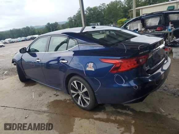 2016 Nissan Maxima Platinum with VIN 1N4AA6AP4GC417412, listed as a Copart auction lot 61597005 with 59,932 mi miles and Salvage title. Bid and sale history available at DreamBid. Image 2.